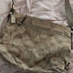 Gold coach messenger purse